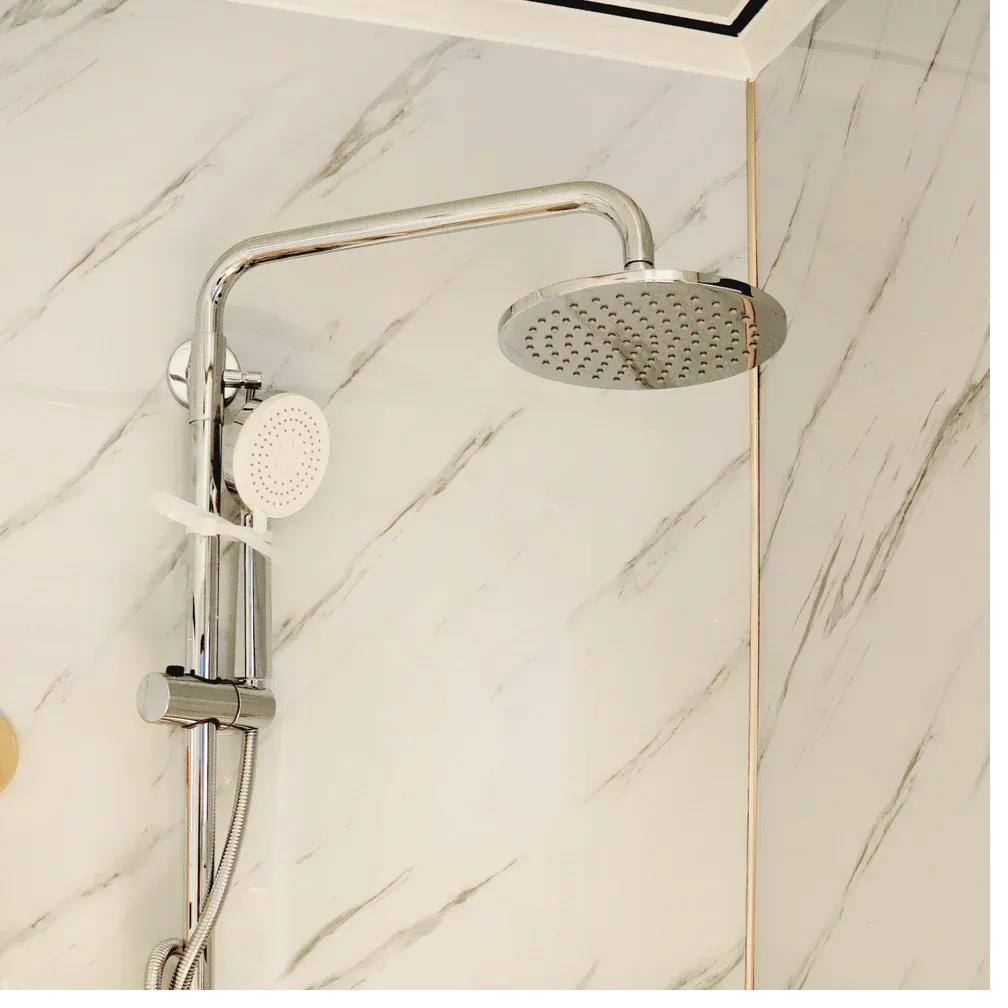 Built-in shower with fold-down seat